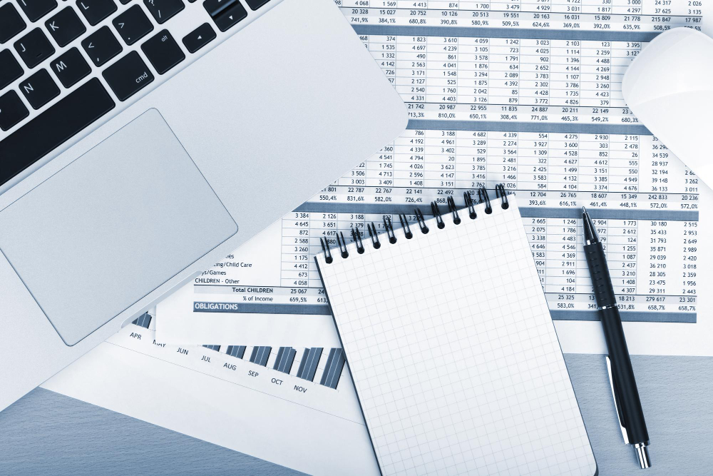 Professional tax planning meeting with documents and calculator